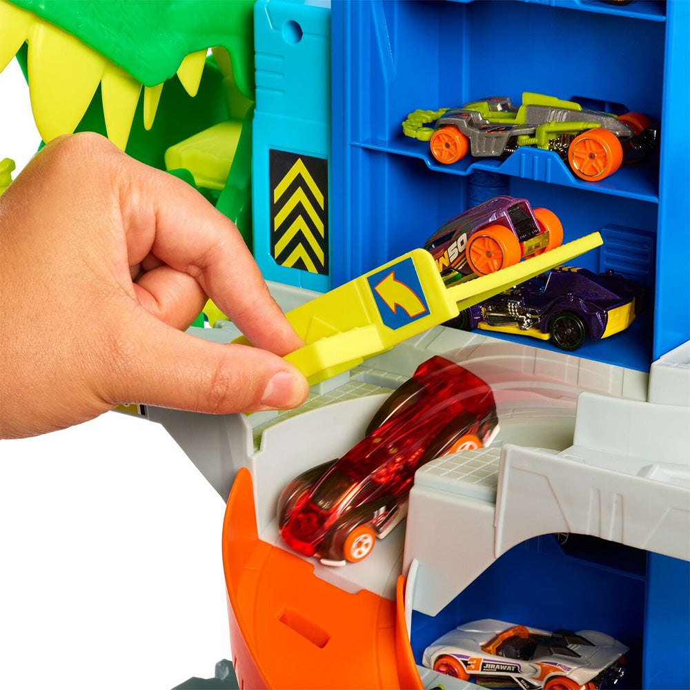 Mattel Hot Wheels City Απόλυτο Γκαράζ T-Rex με Πίστα & 2 Αυτοκινητάκια 
